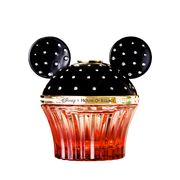 A cupcake-shaped perfume bottle from the Disney x House of Silkage collaboration, featuring a black top with rhinestone-embellished ears and a fluted translucent red-orange base on a white background.