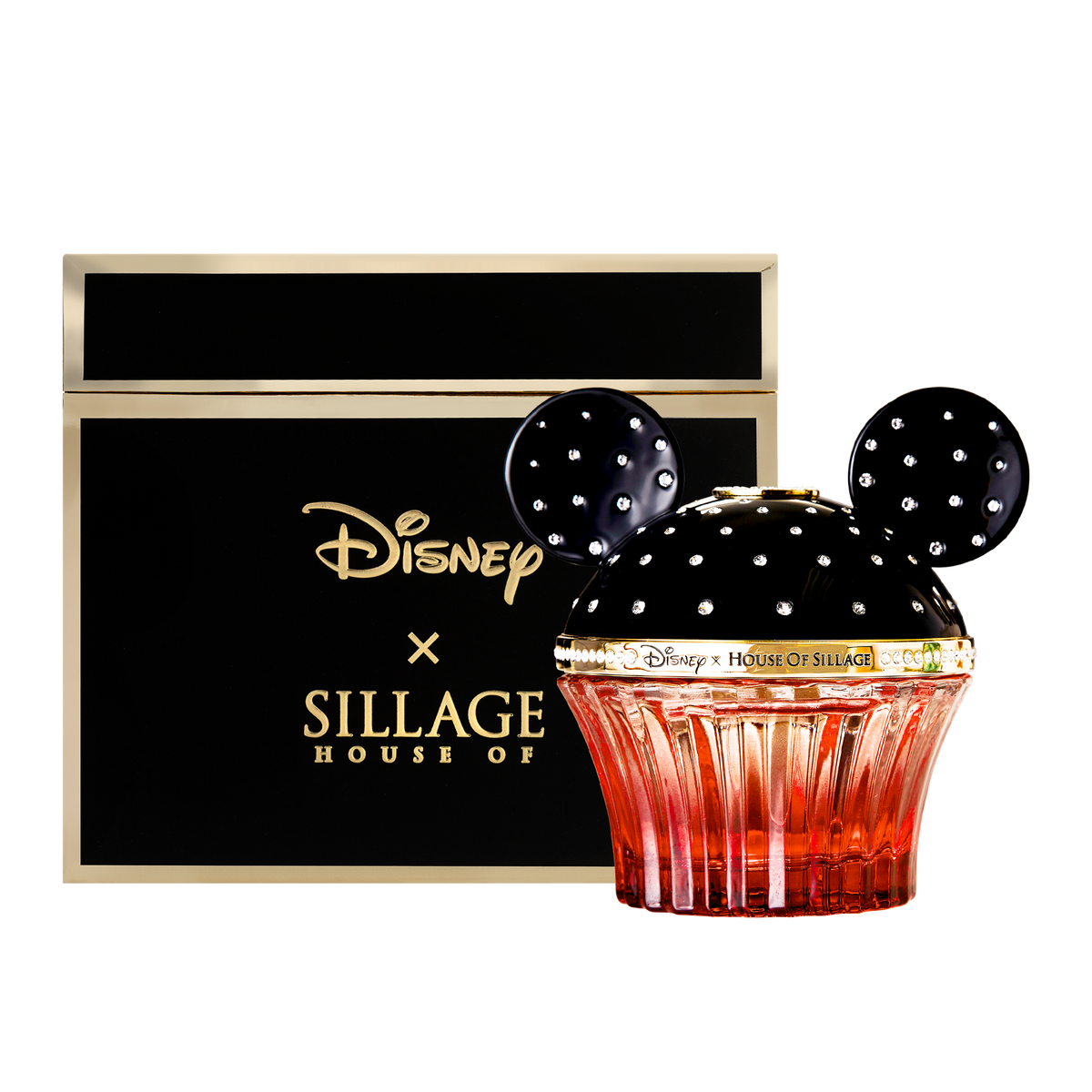 Sillage House of Disney perfume bottle shaped like a Mickey Mouse head in a cupcake container, shown next to its black and gold packaging box on a white background.
